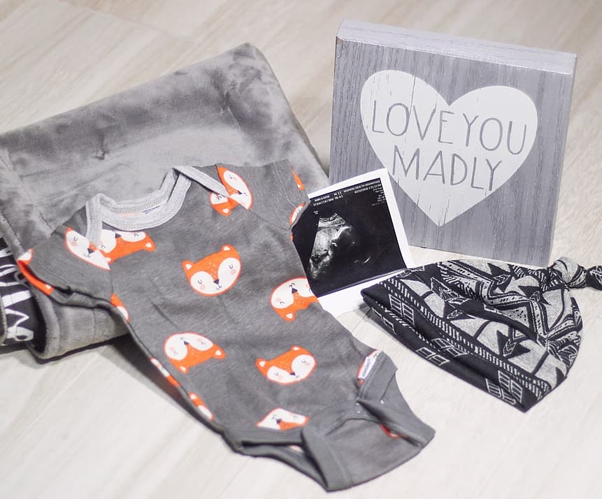 Adorable Items for baby boy - Getting ready to pack a hospital bag - Baby shower gift ideas - Love You Madly - MidKid Mama Blog flatlay