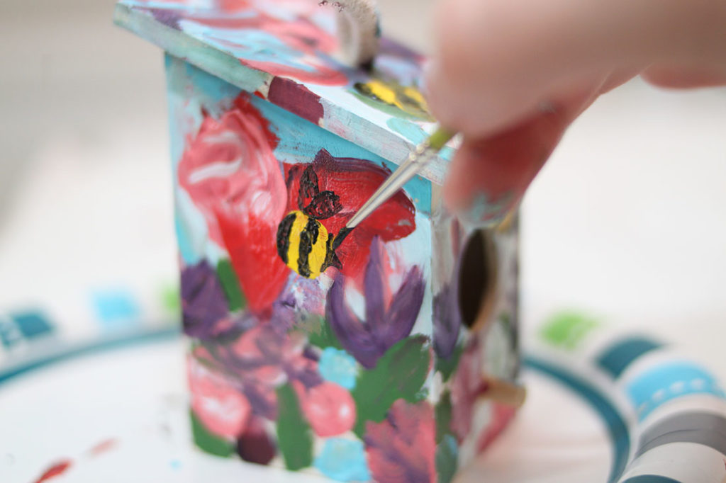 Fun Spring Painting Craft for Kids -- Painting birdhouse decorations to learn about flowers spring bees and birds with kids for preschool or kindergarten -- all ages fine art craft from MidKid Mama Blog