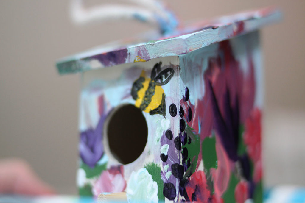 Fun Spring Painting Craft for Kids -- Painting birdhouse decorations to learn about flowers spring bees and birds with kids for preschool or kindergarten -- all ages fine art craft from MidKid Mama Blog