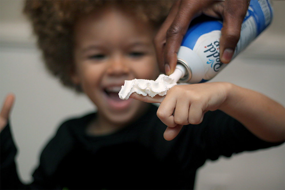 Silly whip cream worms on the finger for simple family fun