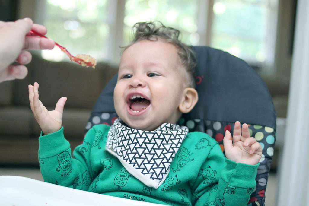 Happy baby at mealtime