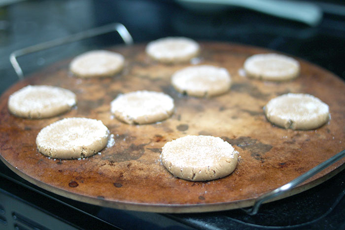 tray of pressed molasses cookies ready to bake